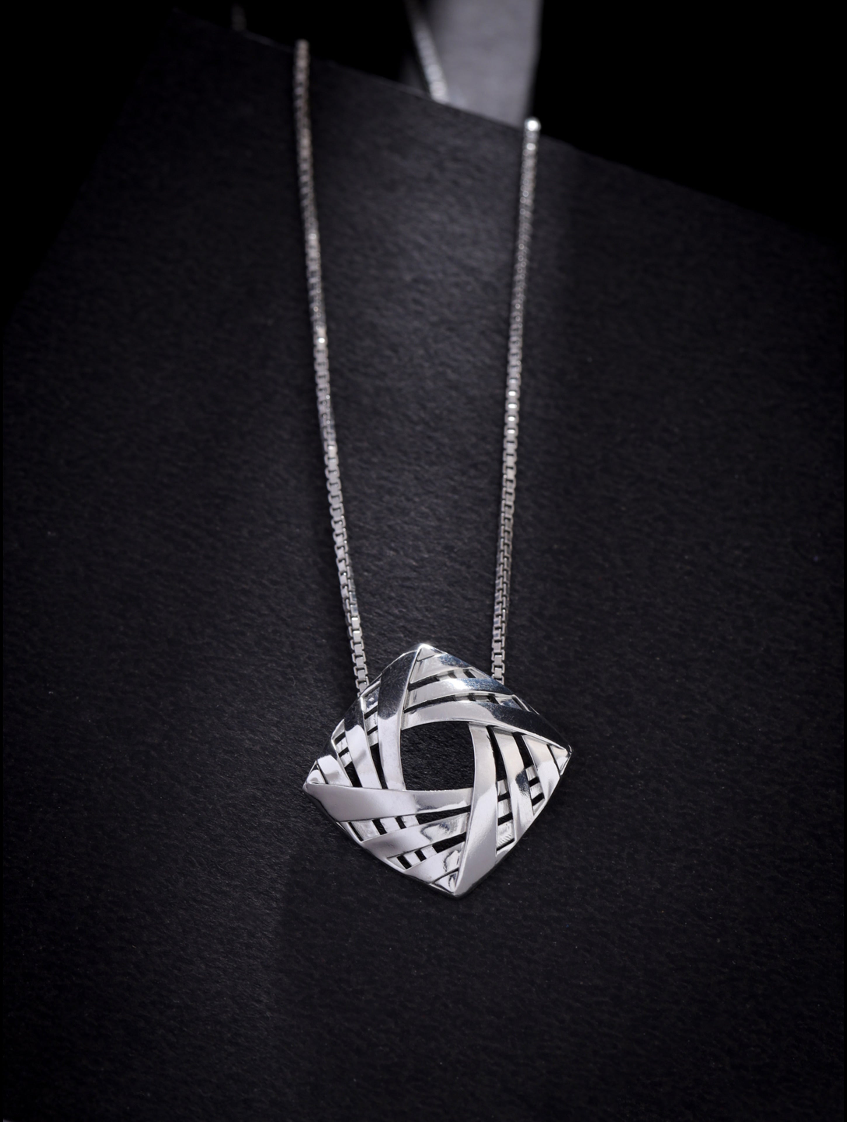 Lumina Rhodium Plated Weaving Design 925 Sterling Silver Pendant For Women